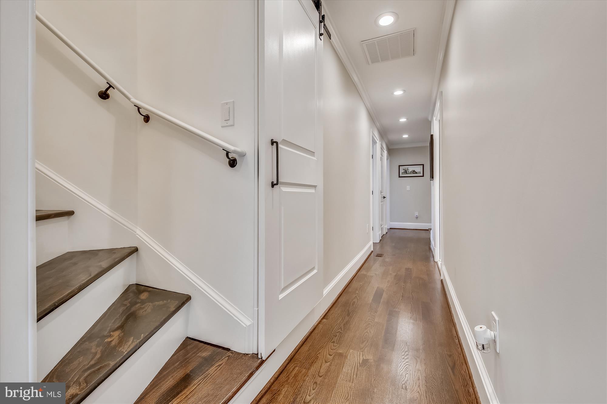 535 Springvale Road Great Falls, VA 22066 - Photo 57 of 80 Newly created stair & barn door to HUGE storage rm