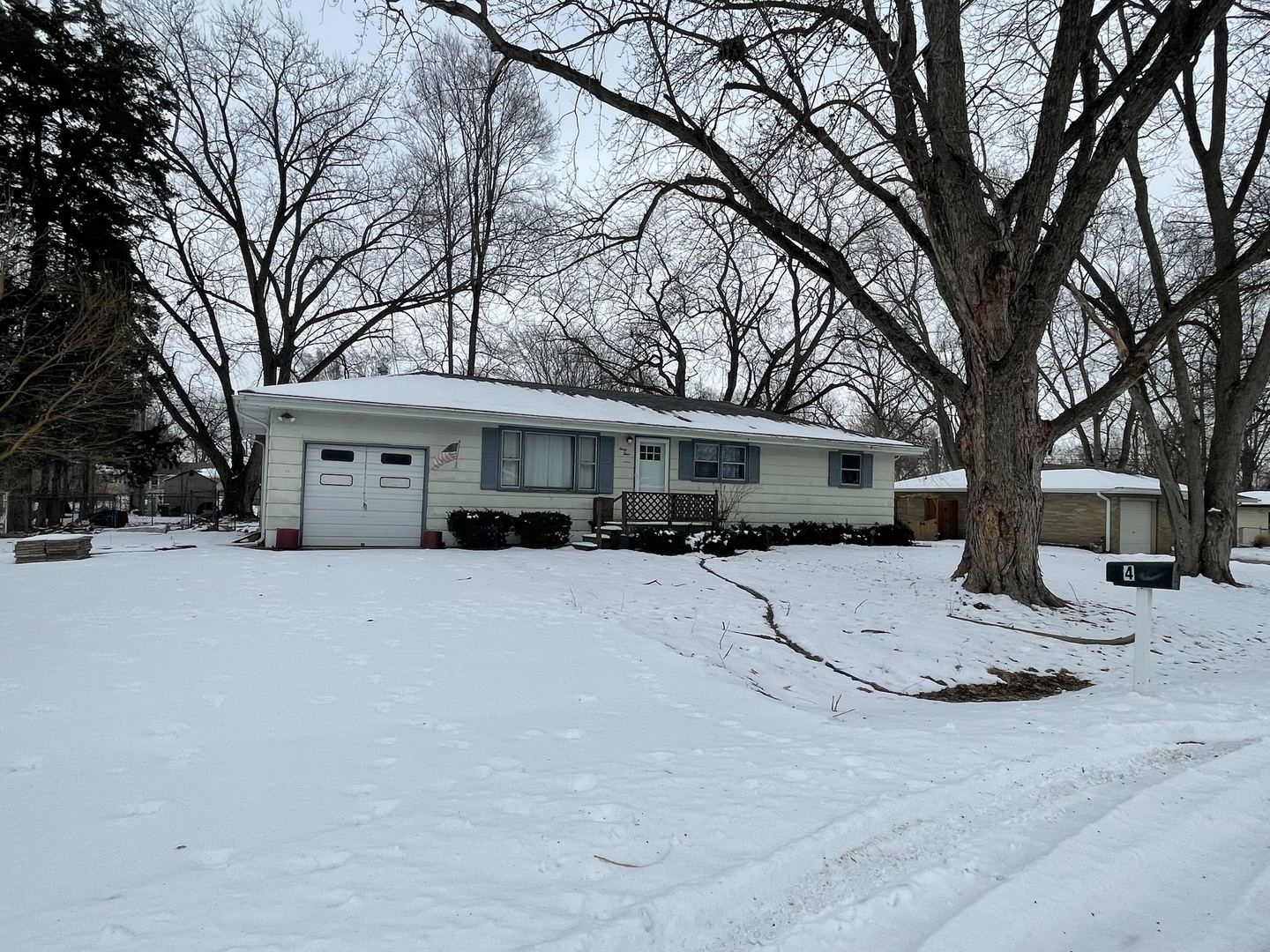 44 Norman Street Kankakee, IL 60901 - Photo 2 of 14 a view of a house with snow on the road