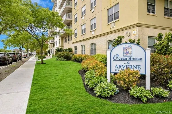 a view of a sign board with yard