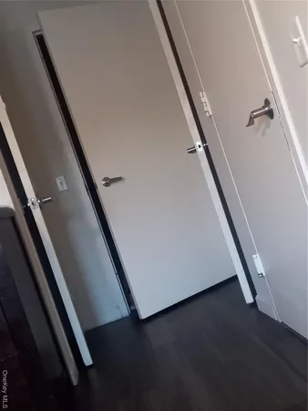 wooden floor and an entryway