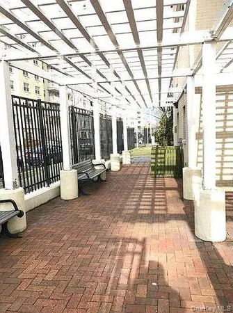 a view of a porch with furniture