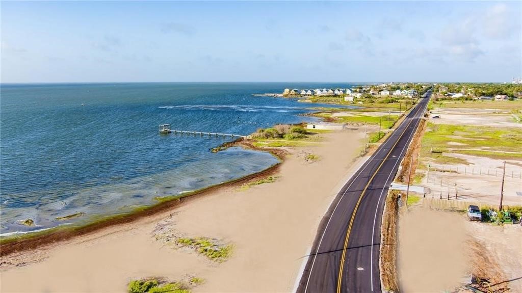 2805 Laguna Shores Road Corpus Christi, TX 78418 - Photo 4 of 5 view of a swimming pool with an ocean view
