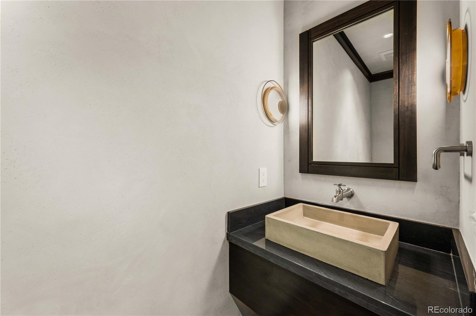 21261 Broadview Road Nathrop, CO 81236 - Photo 19 of 49 a bathroom with a sink and a mirror