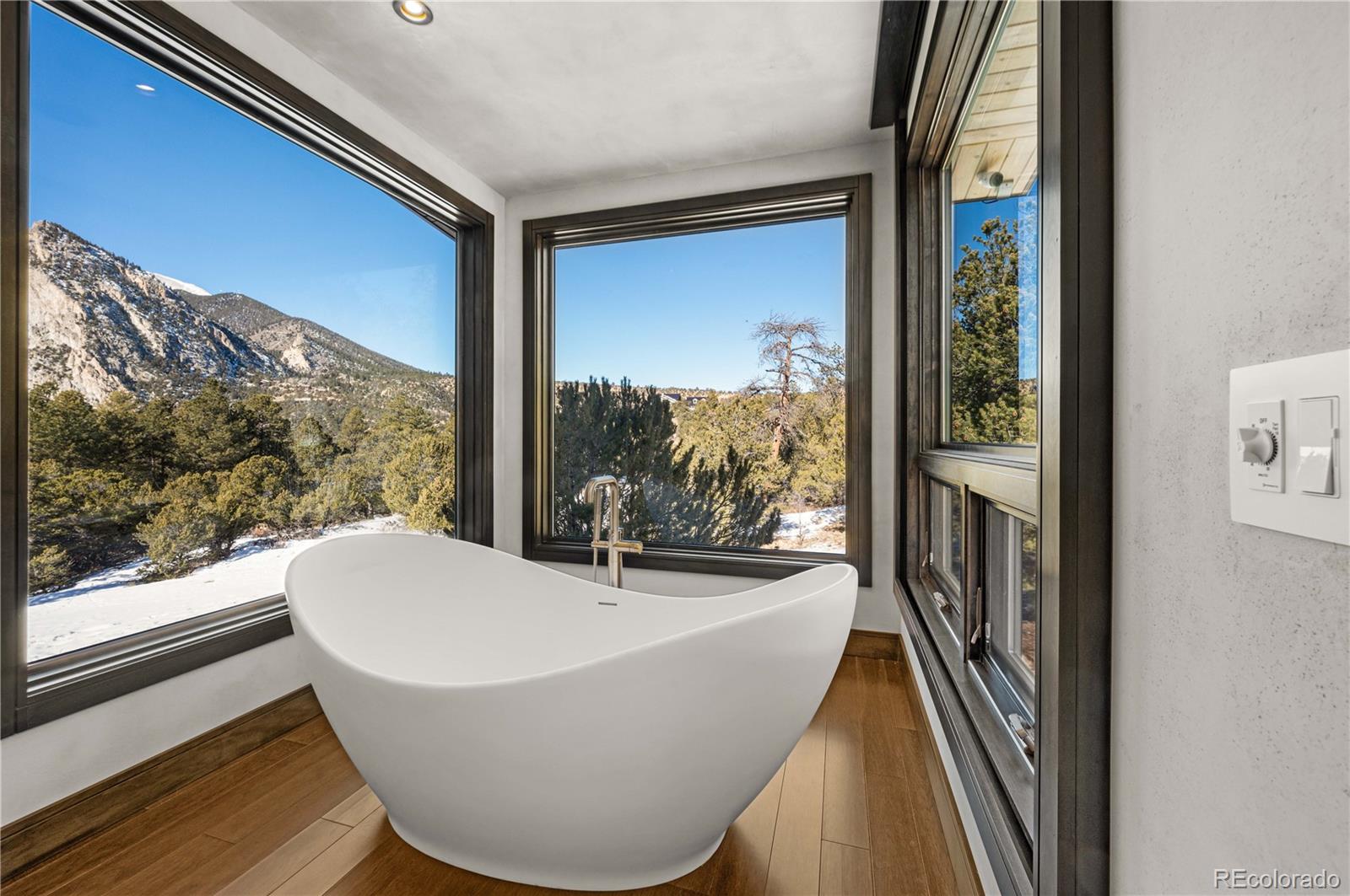 21261 Broadview Road Nathrop, CO 81236 - Photo 24 of 49 a view of a living room with a floor to ceiling window