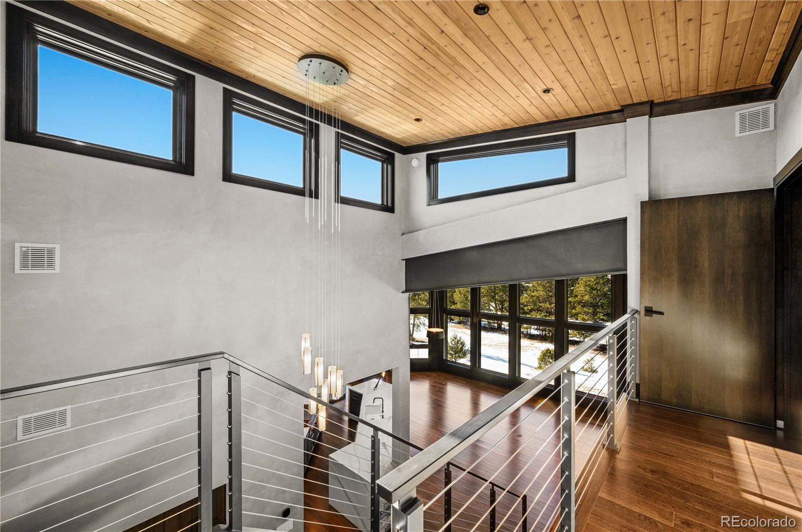 21261 Broadview Road Nathrop, CO 81236 - Photo 29 of 49 a view of entryway livingroom and hall with wooden floor