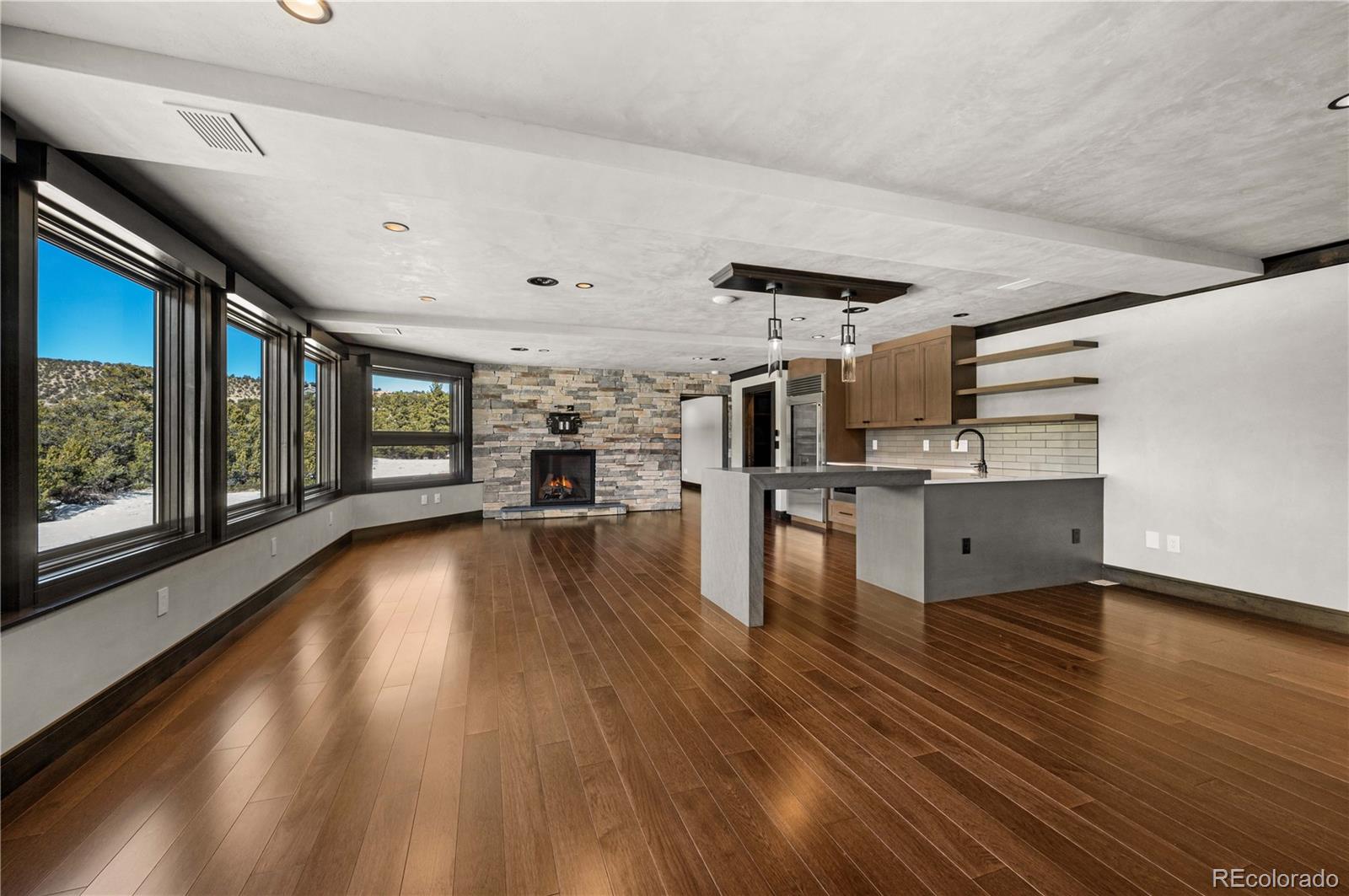 21261 Broadview Road Nathrop, CO 81236 - Photo 35 of 49 a view of kitchen with furniture and wooden floor