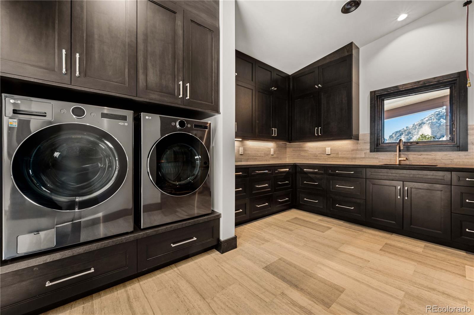 21261 Broadview Road Nathrop, CO 81236 - Photo 40 of 49 a kitchen with a sink and cabinets