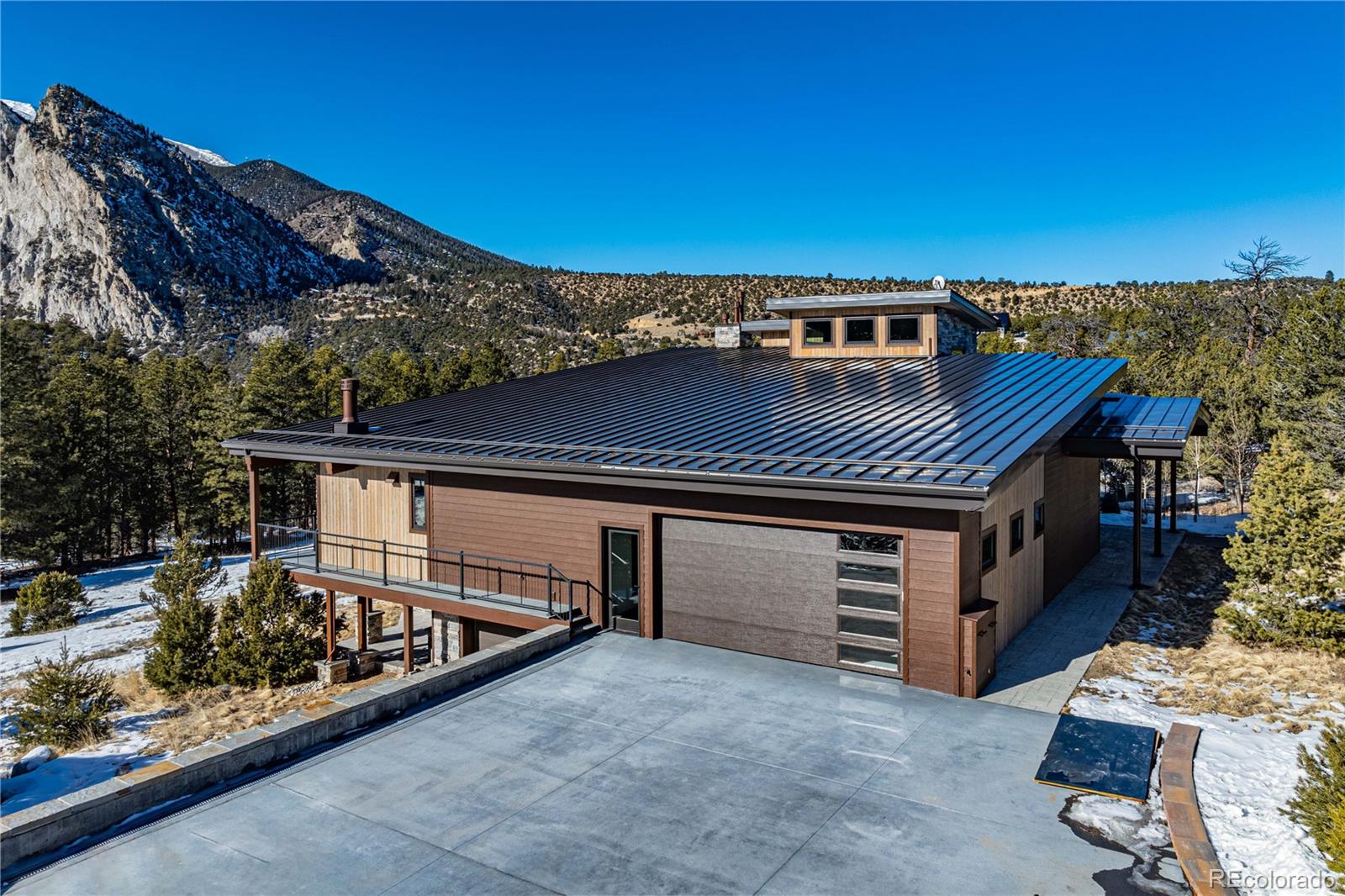 21261 Broadview Road Nathrop, CO 81236 - Photo 47 of 49 a view of a house with a balcony wooden floor and a tub