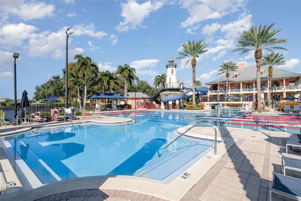 302 Latitude Place Apollo Beach, FL 33572 - Photo 37 of 50 a view of a swimming pool with outdoor seating