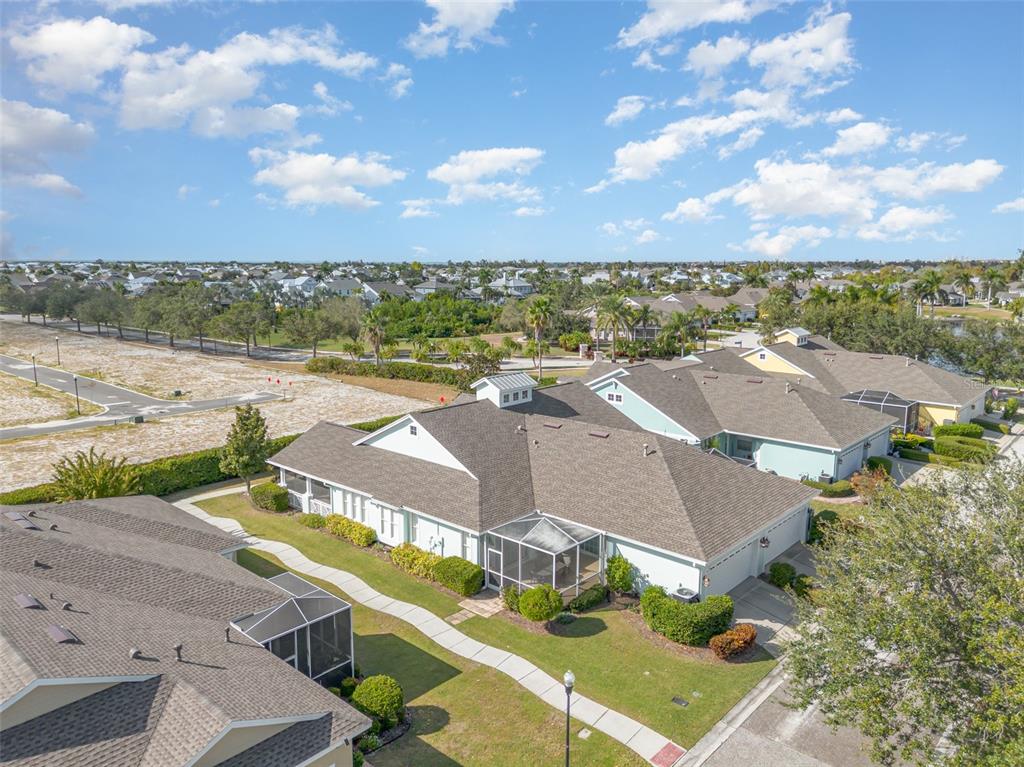 302 Latitude Place Apollo Beach, FL 33572 - Photo 38 of 50 an aerial view of residential houses with outdoor space