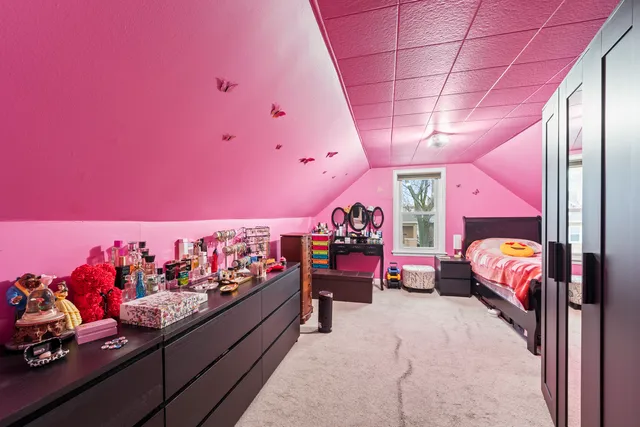 a bed room with furniture and a bed