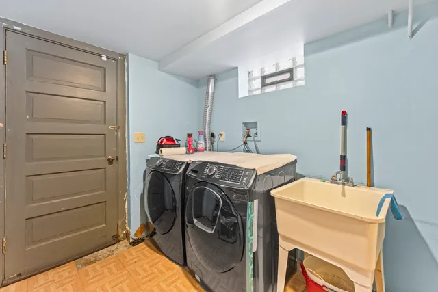a utility room with dryer and washer