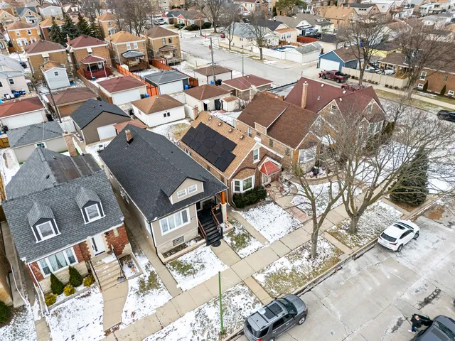 an aerial view of a city with lots of residential buildings