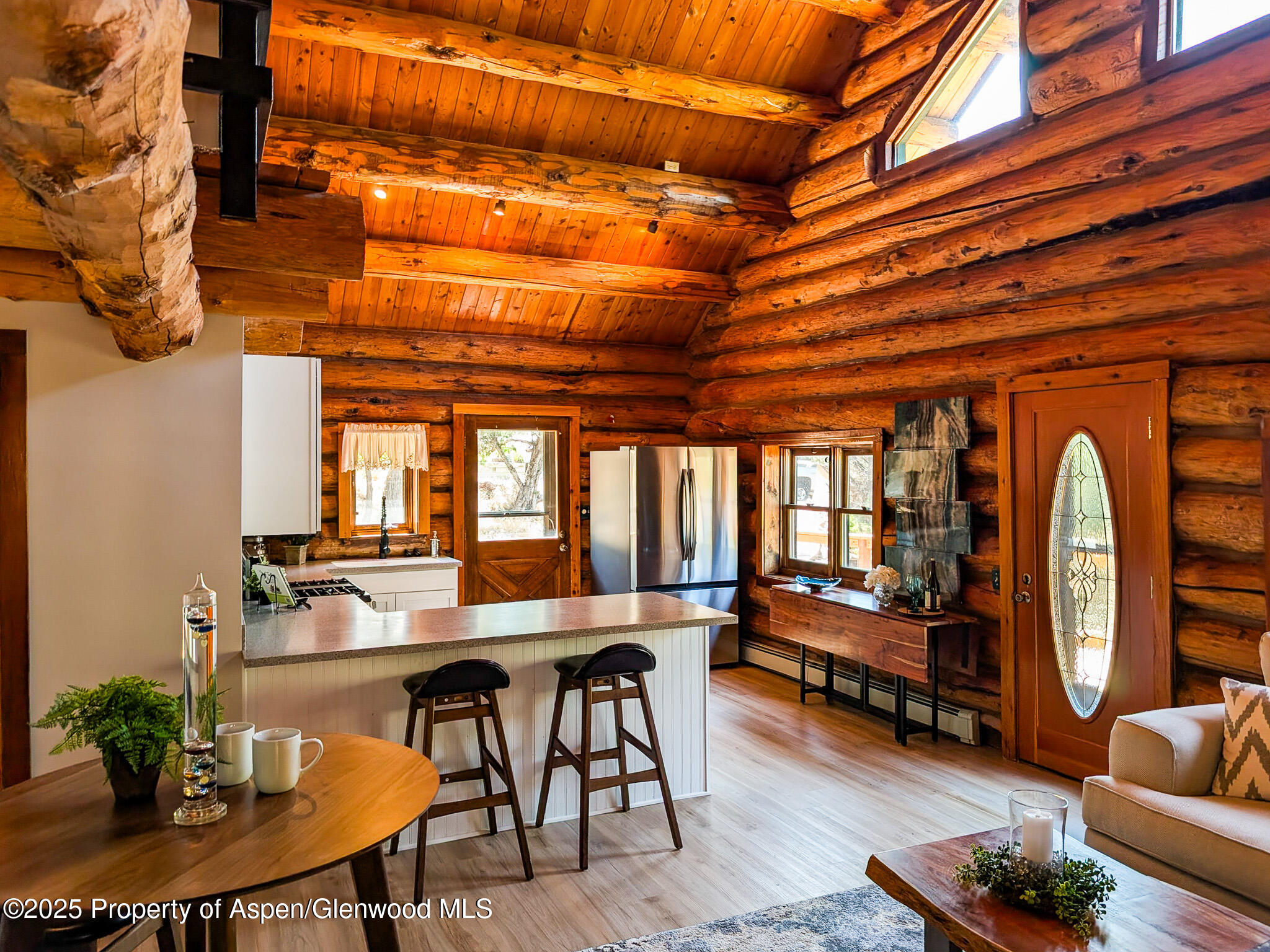 96 Apache Drive New Castle, CO 81647 - Photo 11 of 34 a dining room with furniture and a chandelier