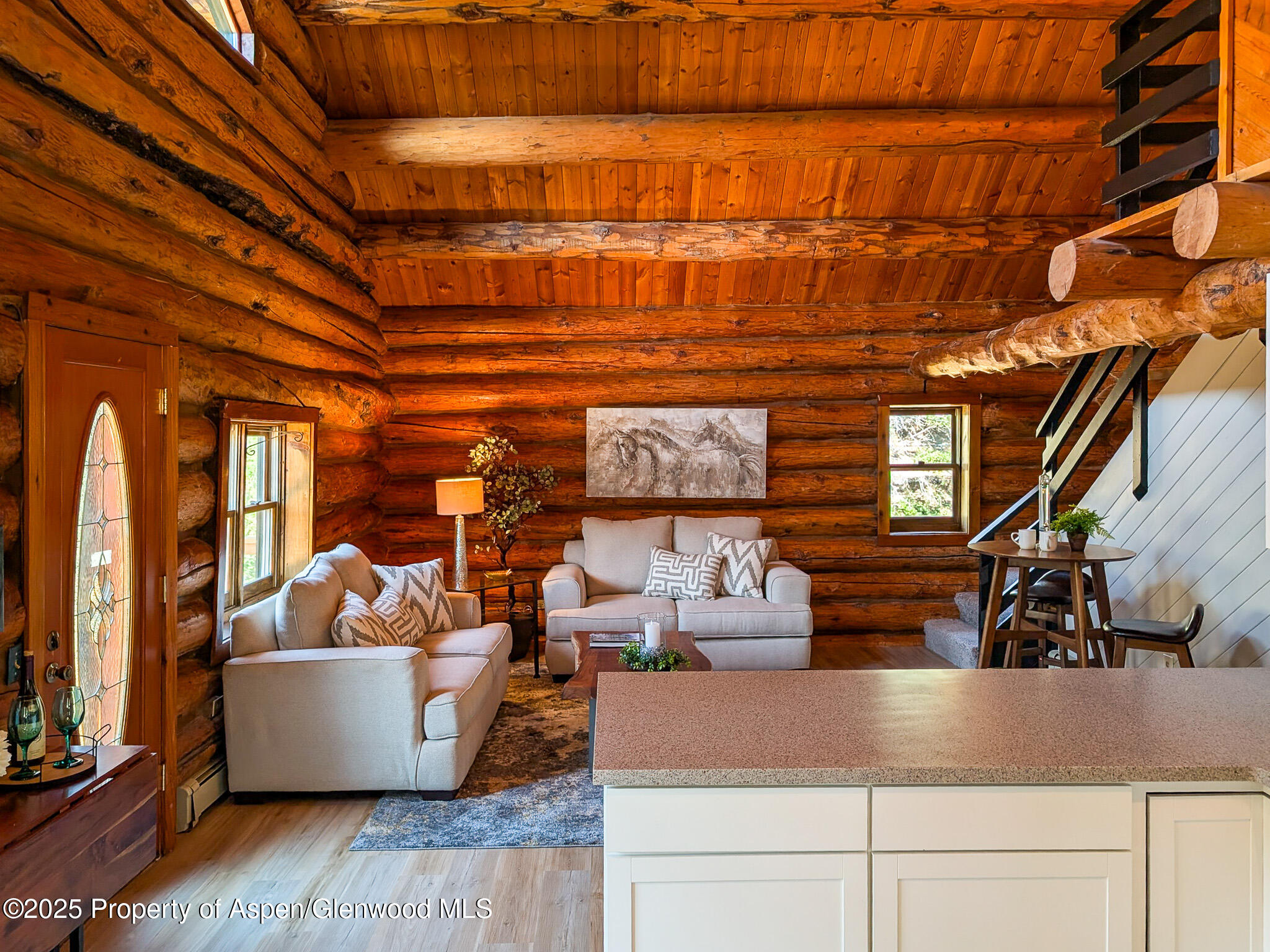 96 Apache Drive New Castle, CO 81647 - Photo 13 of 34 a living room with furniture and a large window