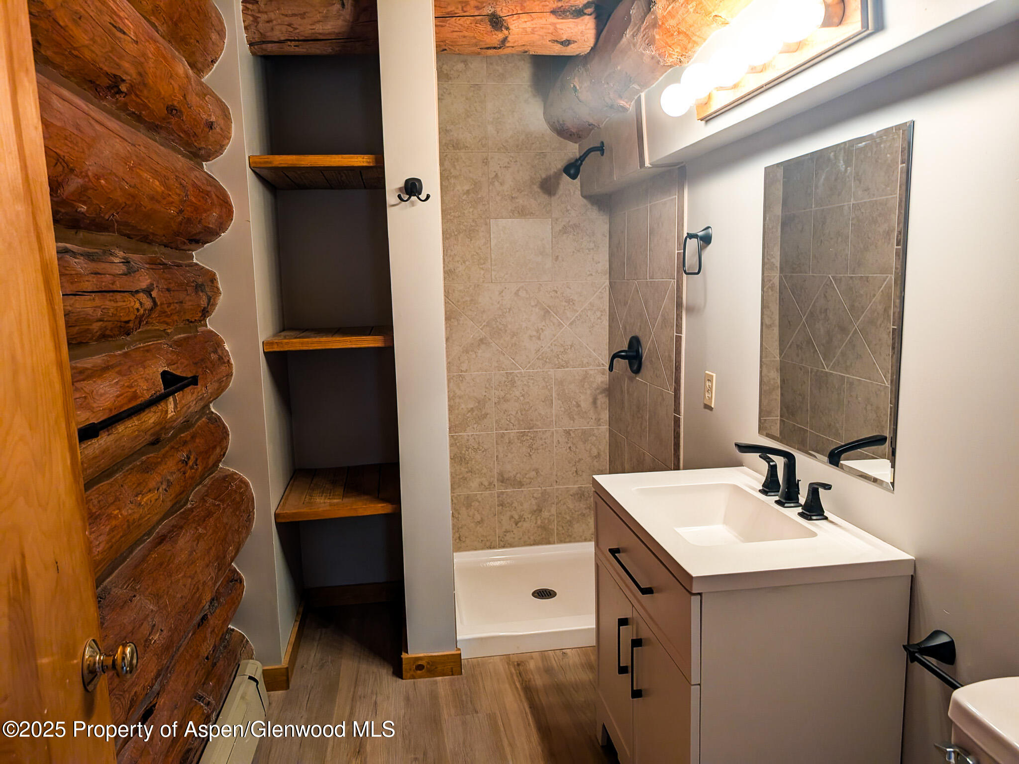 96 Apache Drive New Castle, CO 81647 - Photo 18 of 34 a bathroom with a sink and a mirror