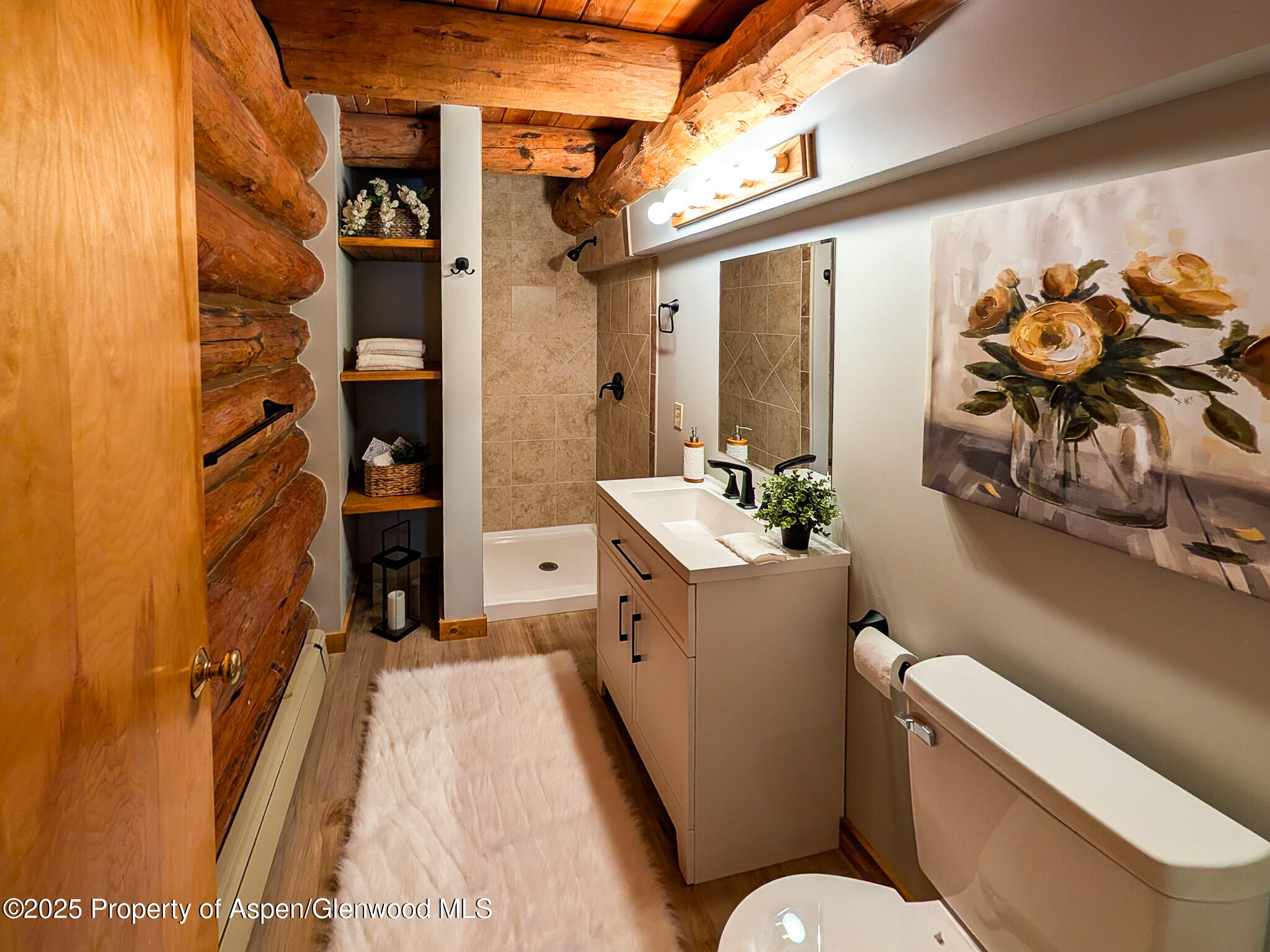 96 Apache Drive New Castle, CO 81647 - Photo 19 of 34 a bathroom with a sink toilet and shower
