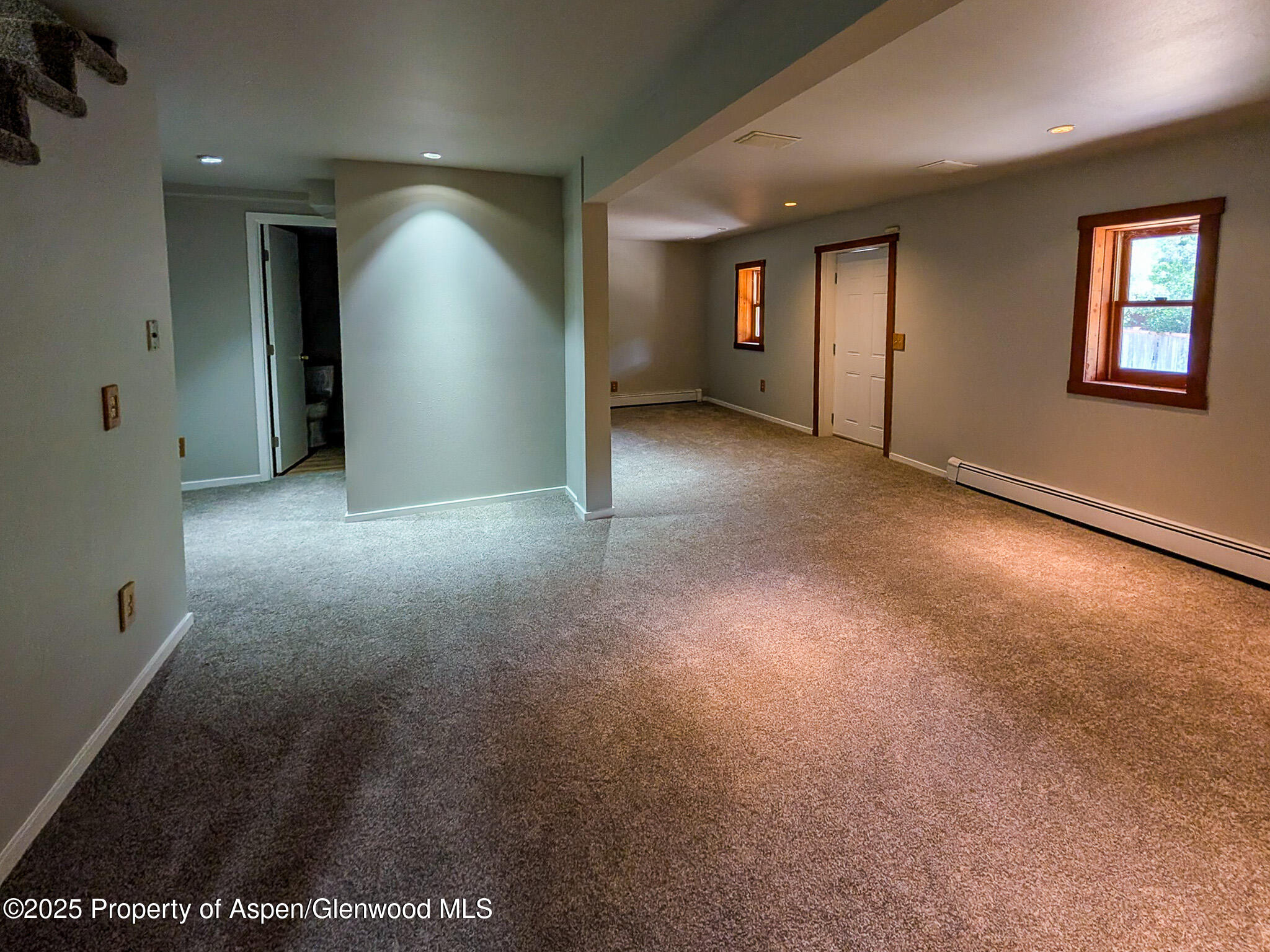 96 Apache Drive New Castle, CO 81647 - Photo 24 of 34 an empty room with windows and entrance