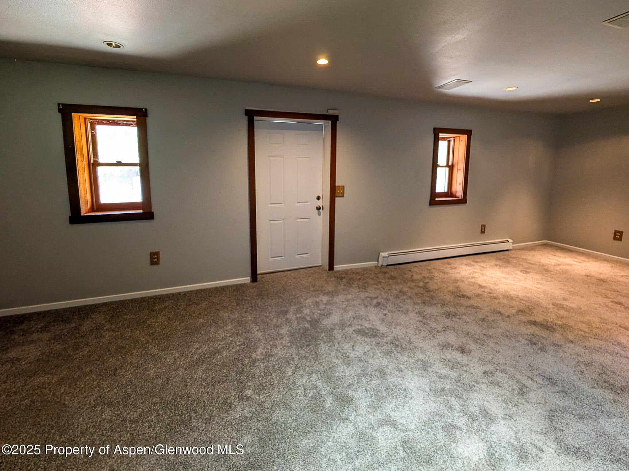 96 Apache Drive New Castle, CO 81647 - Photo 25 of 34 a view of an empty room with windows