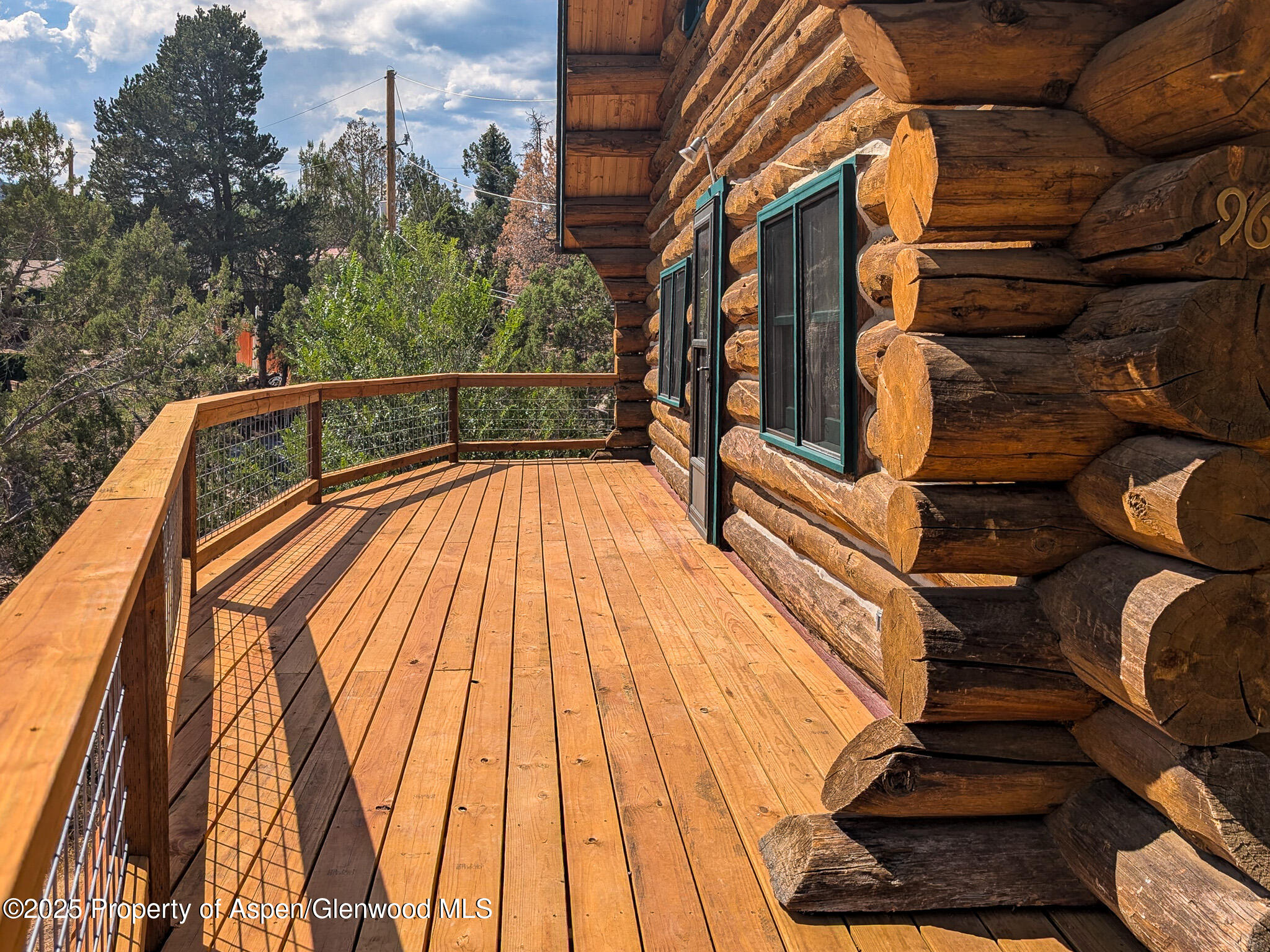 96 Apache Drive New Castle, CO 81647 - Photo 7 of 34 a view of balcony with wooden floor