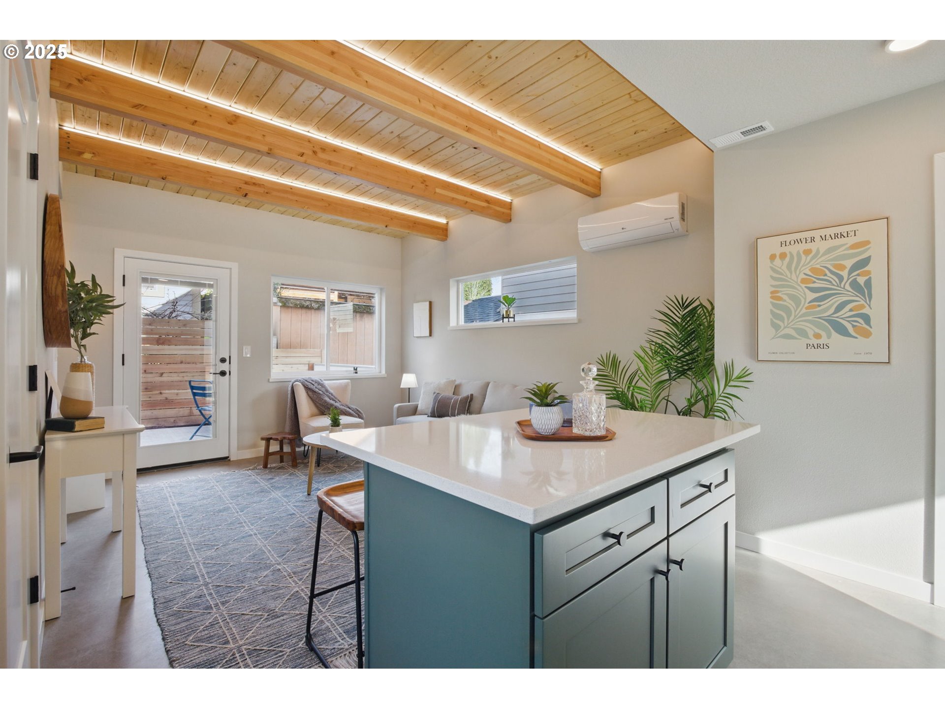 1123 Southeast Rhone Street, Unit B Portland, OR 97202 - Photo 12 of 30 a kitchen with a sink cabinets and wooden floor