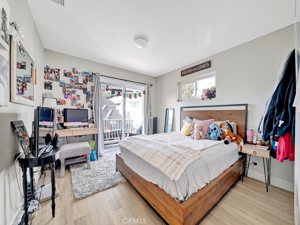 34102 Crystal Lantern Dana Point, CA 92629 - Photo 23 of 43 a bedroom with a bed a couch and dresser