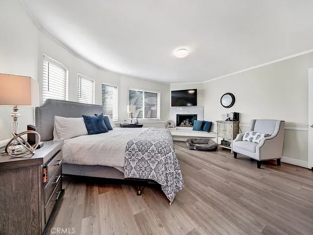 a bedroom with bed and window