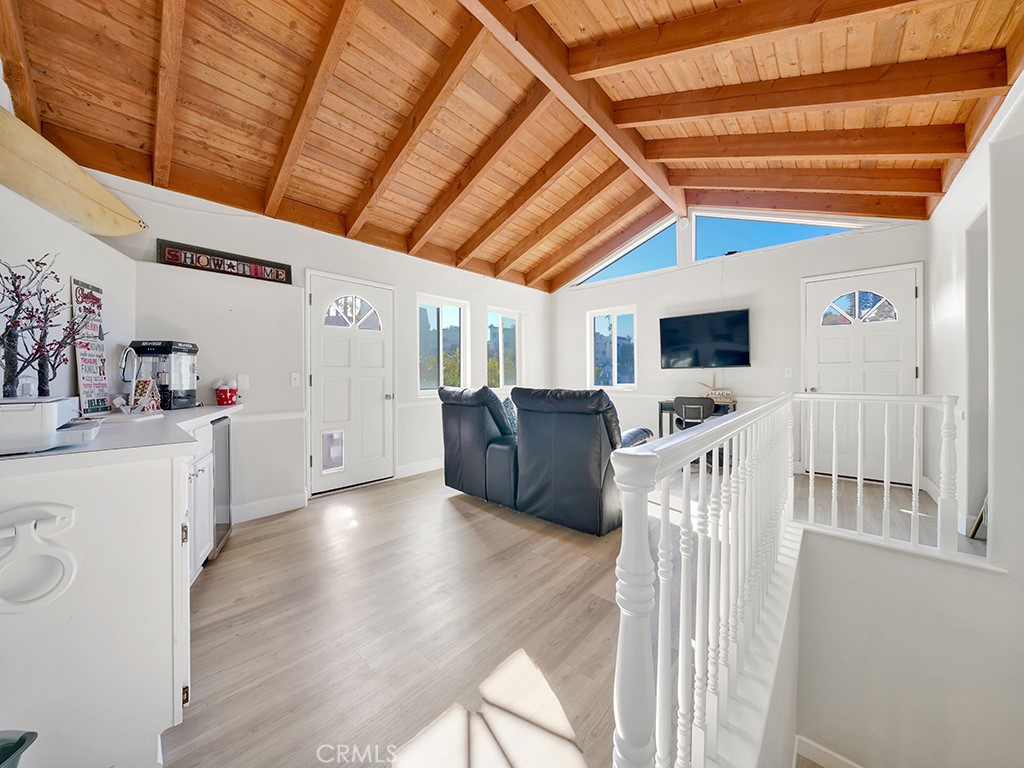 34102 Crystal Lantern Dana Point, CA 92629 - Photo 33 of 43 a living room with furniture and flat screen tv
