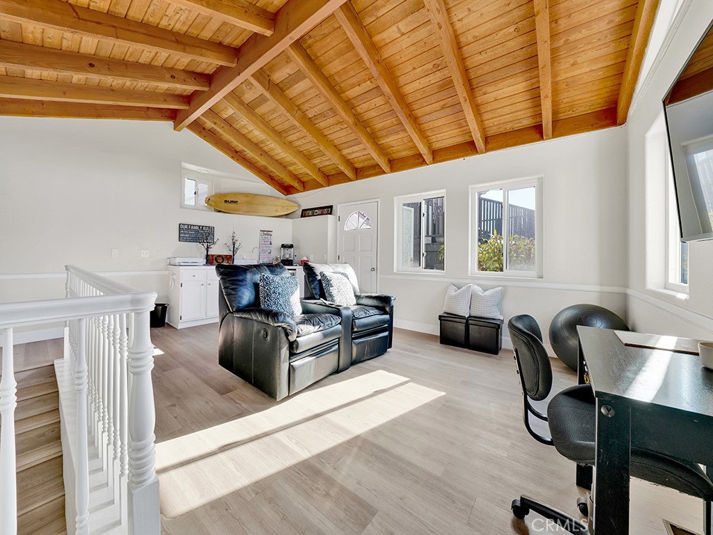 34102 Crystal Lantern Dana Point, CA 92629 - Photo 36 of 43 a living room with furniture and a wooden floor