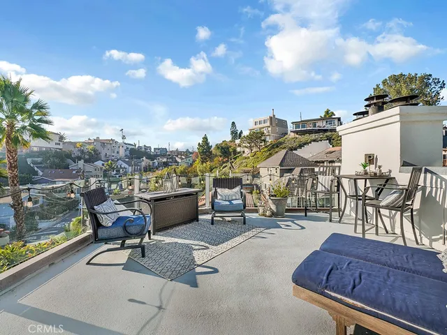 a view of a terrace with seating area