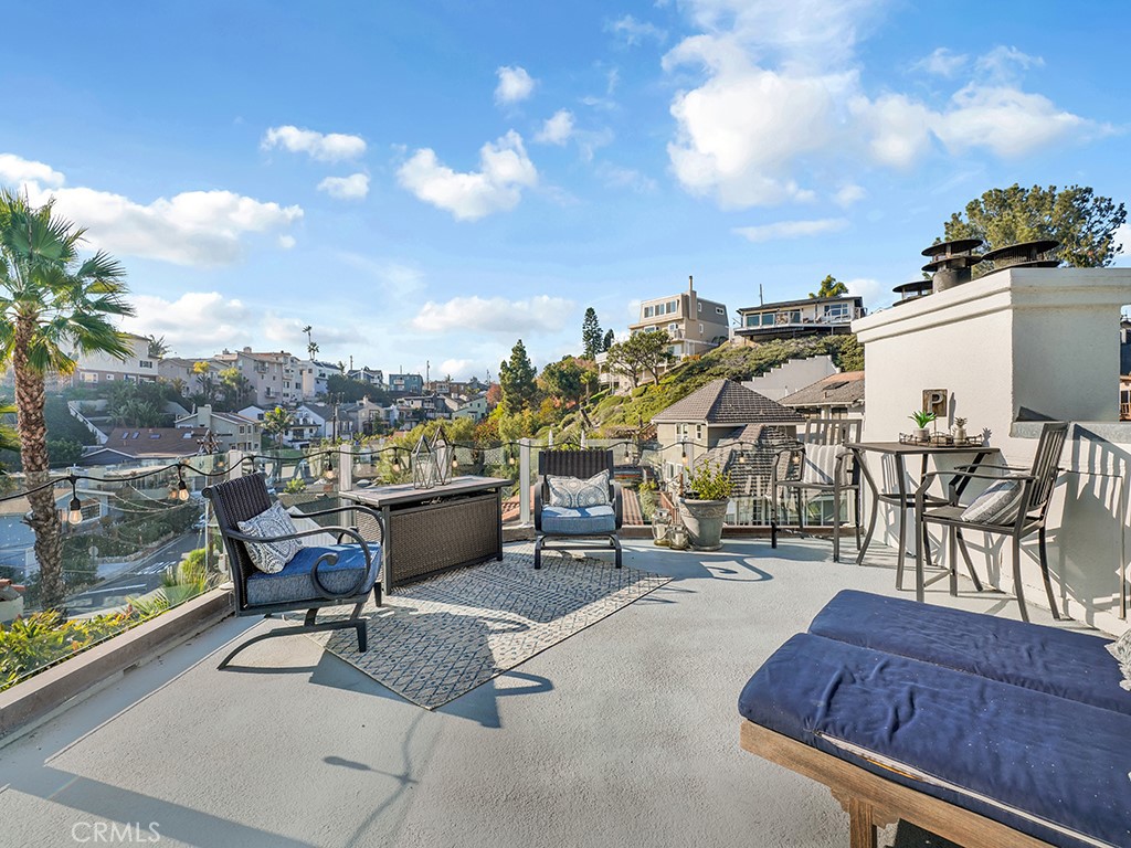 34102 Crystal Lantern Dana Point, CA 92629 - Photo 37 of 43 a view of a terrace with seating area
