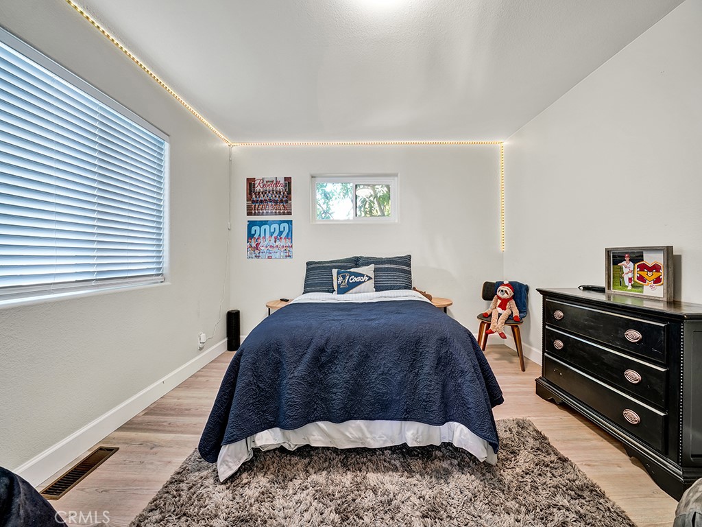 34102 Crystal Lantern Dana Point, CA 92629 - Photo 43 of 43 a bedroom with a bed and a window