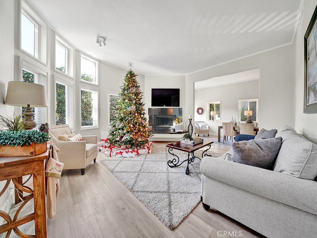 34102 Crystal Lantern Dana Point, CA 92629 - Photo 7 of 43 a living room with furniture and flowers