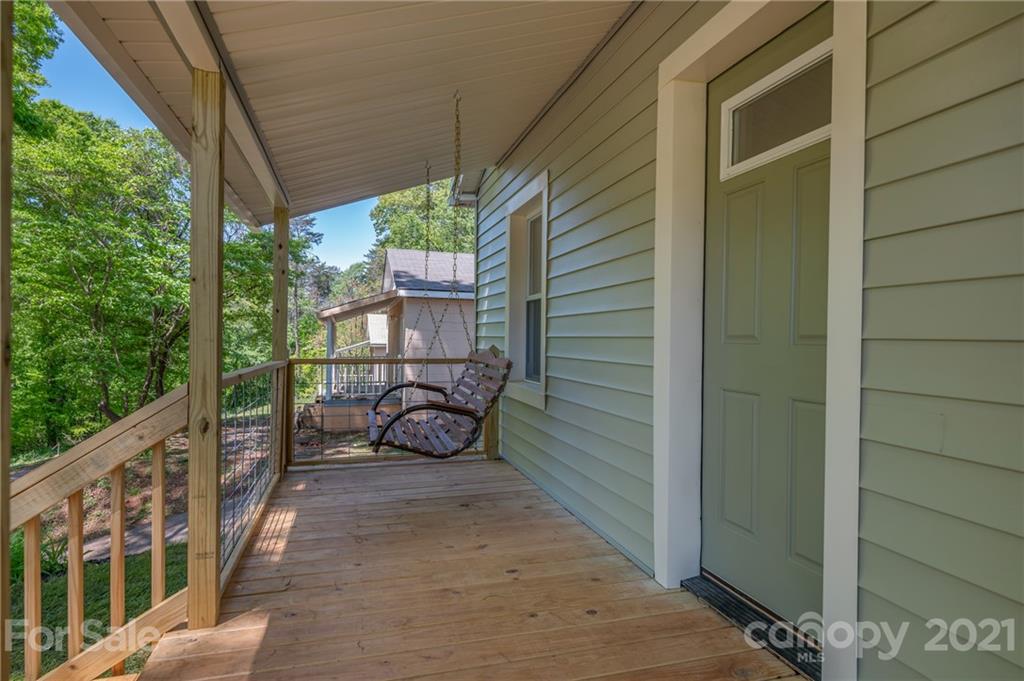 116 Riley Court Rutherfordton, NC 28139 - Photo 2 of 28 a view of a porch with wooden floor