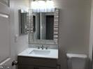 2503 Stokes Road Mount Laurel, NJ 08054 - Photo 10 of 22 a bathroom with a sink and a mirror