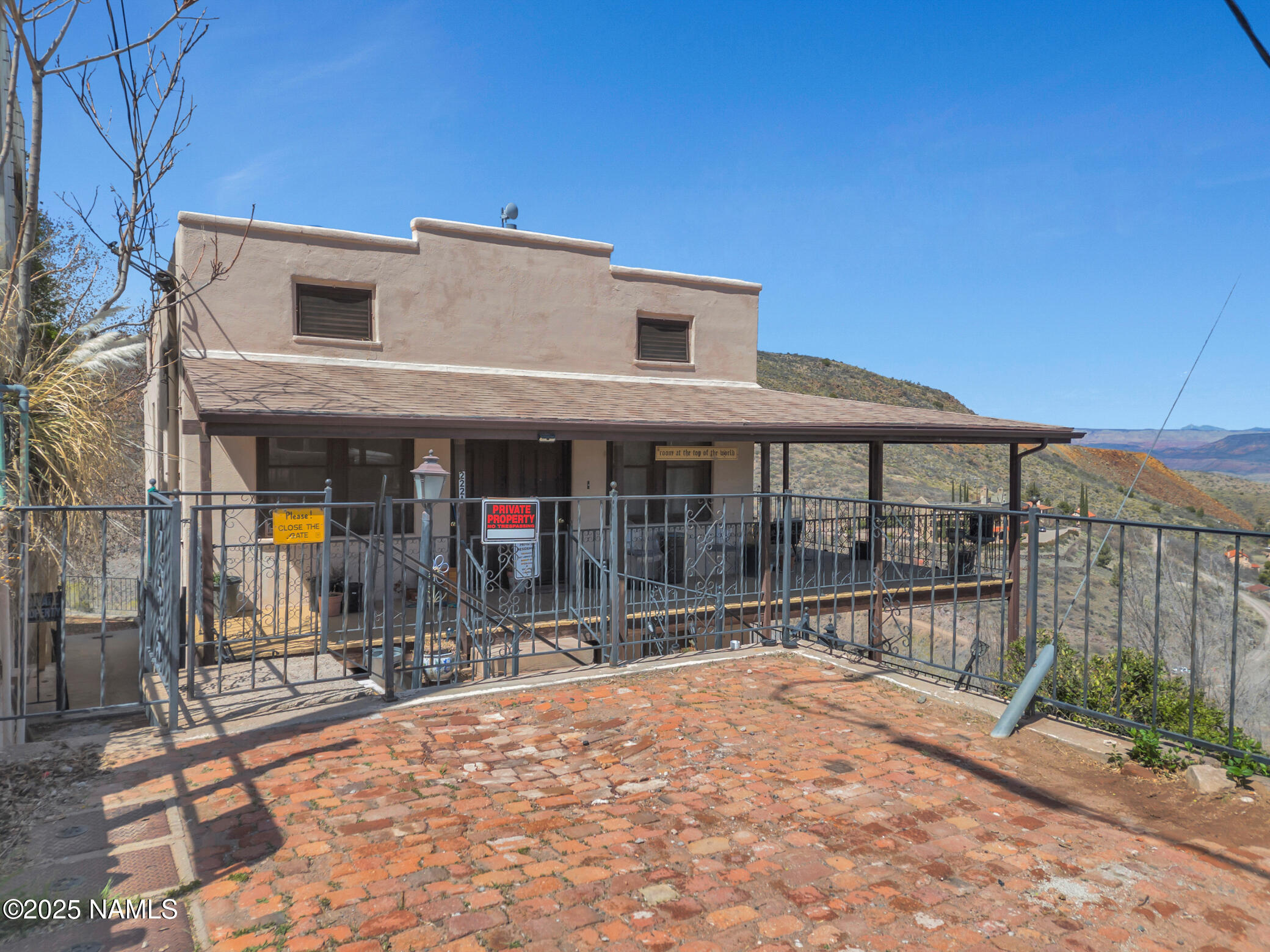 222 1st Avenue, Unit B Jerome, AZ 86331 - Photo 13 of 14 front view of a house with a porch