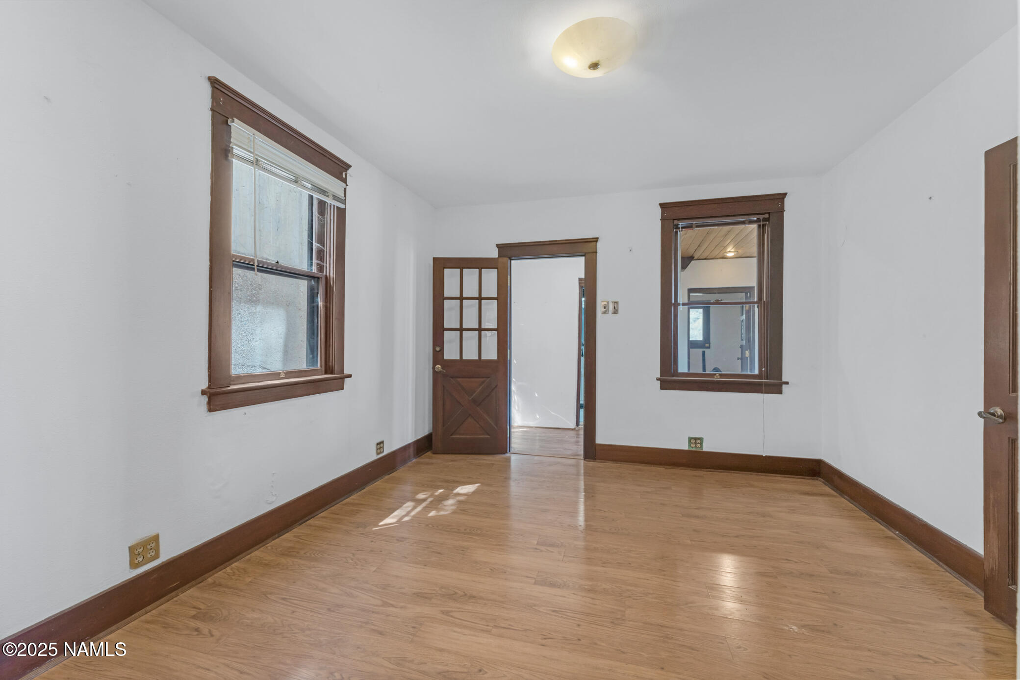 222 1st Avenue, Unit B Jerome, AZ 86331 - Photo 8 of 14 an empty room with windows