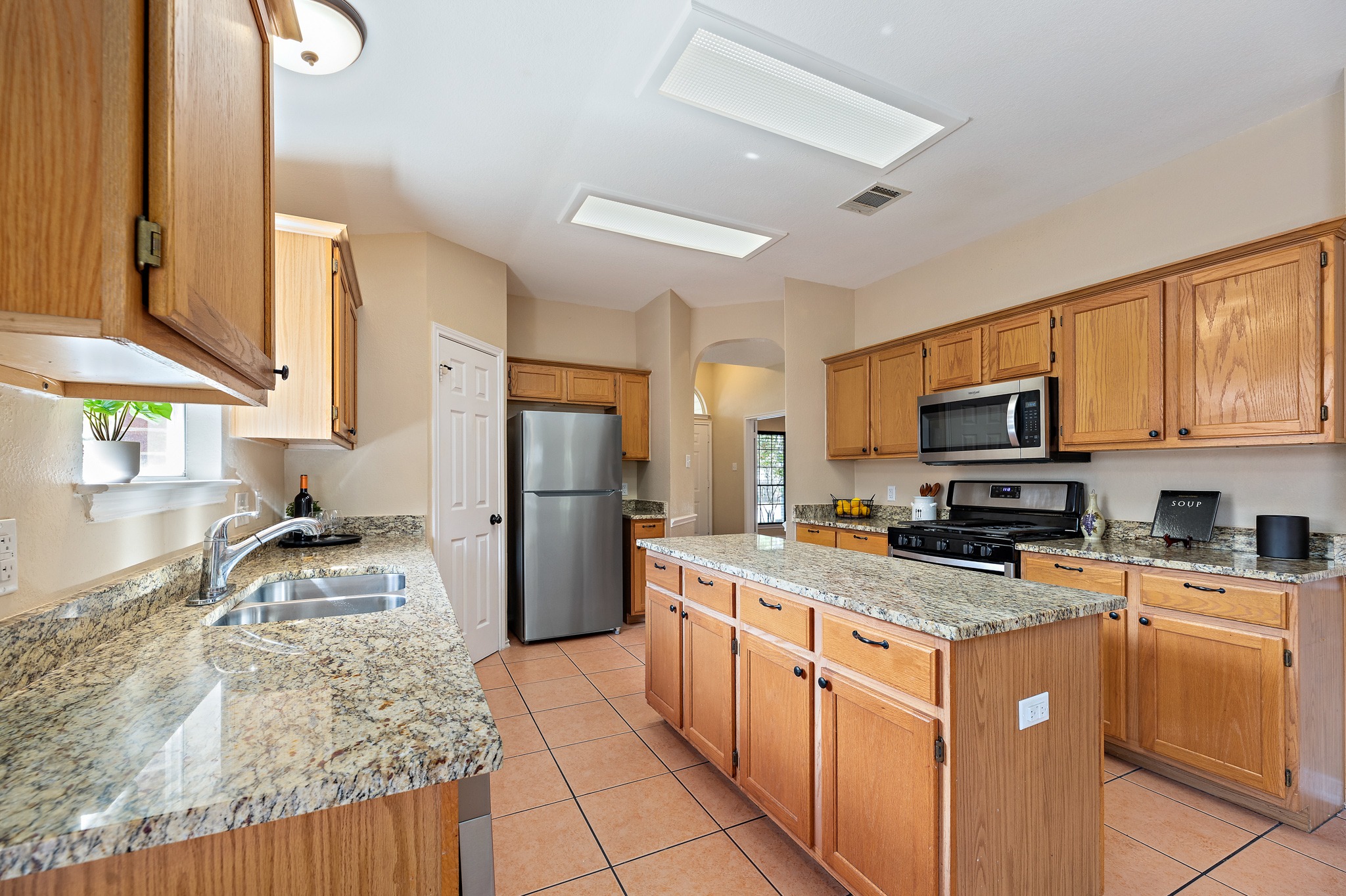 1208 Lochaline Loop Pflugerville, TX 78660 - Photo 13 of 40 Gas Range and built in microwave