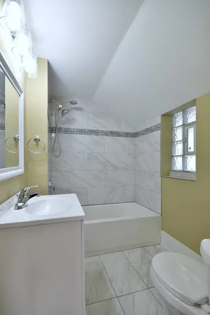 a view of a room that has a washer and dryer