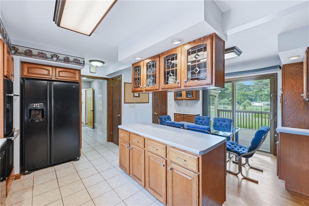 612 Methodist Road Greenville, PA 16125 - Photo 30 of 48 KITCHEN W/ ISLAND AND GLASS FRONT CABINETS ABOVE