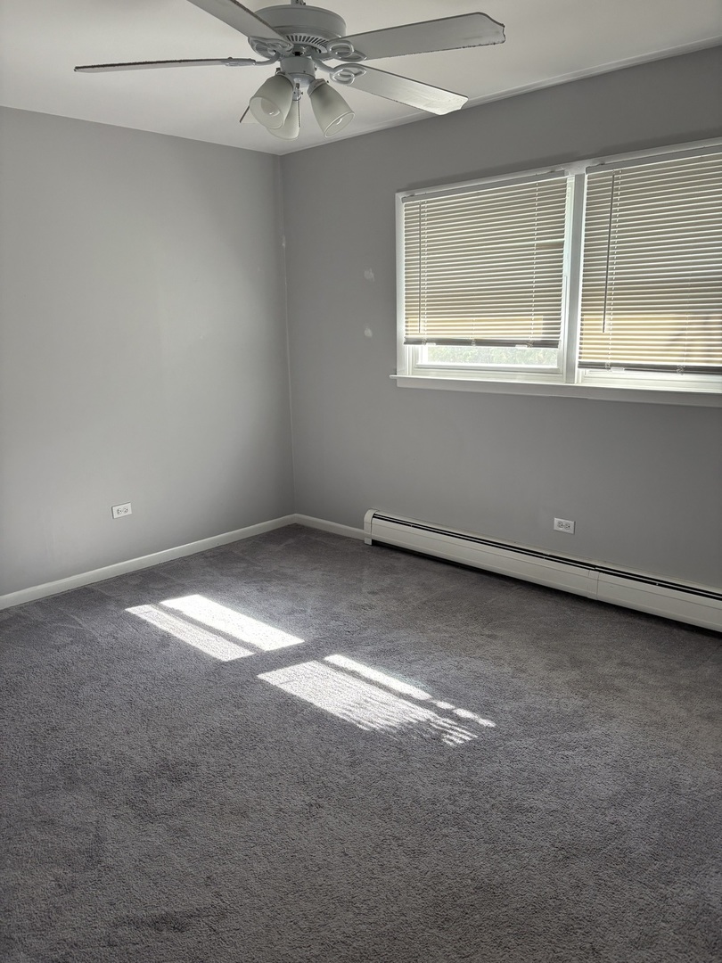 4521 Maple Avenue, Unit 2S Brookfield, IL 60513 - Photo 8 of 8 an empty room with a window