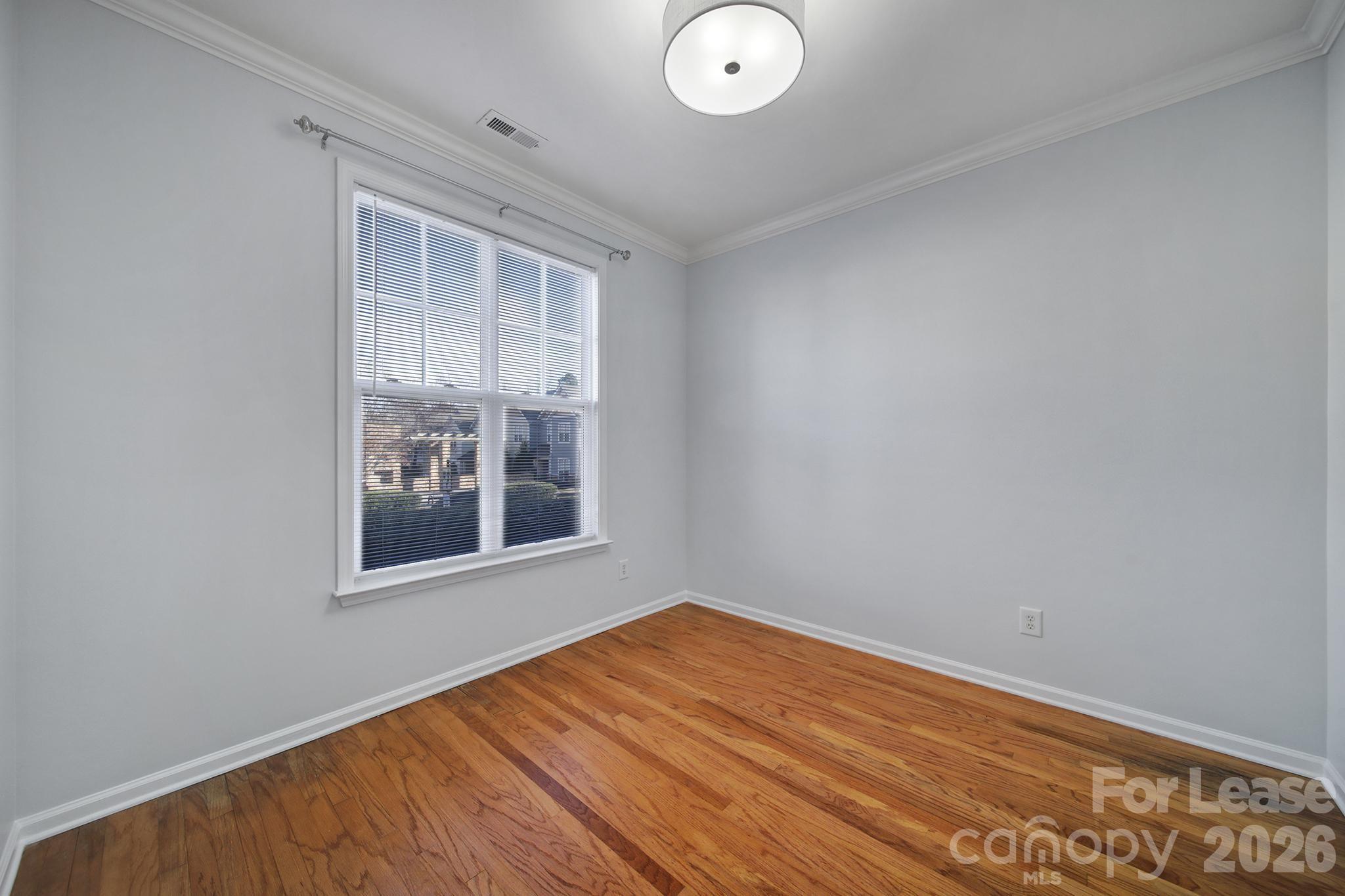 14844 Scothurst Lane Charlotte, NC 28277 - Photo 13 of 33 a view of empty room with window