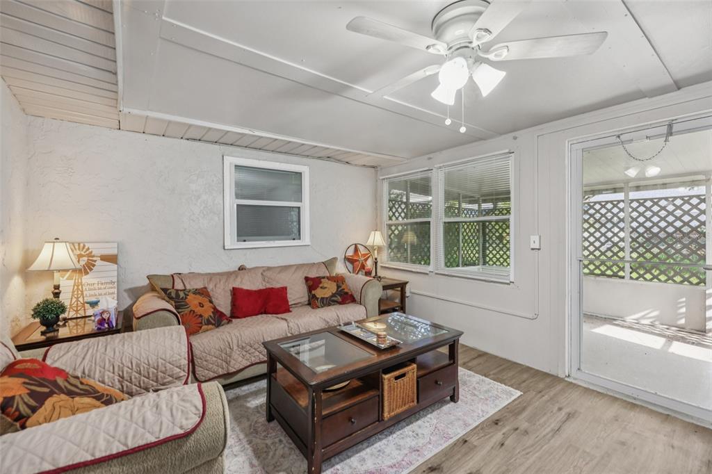 3 Silver Court Ocala, FL 34472 - Photo 16 of 25 a living room with furniture and a large window