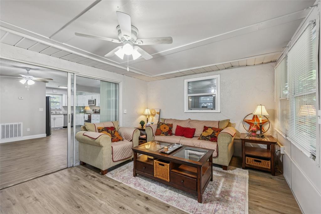 3 Silver Court Ocala, FL 34472 - Photo 17 of 25 a living room with furniture and wooden floor