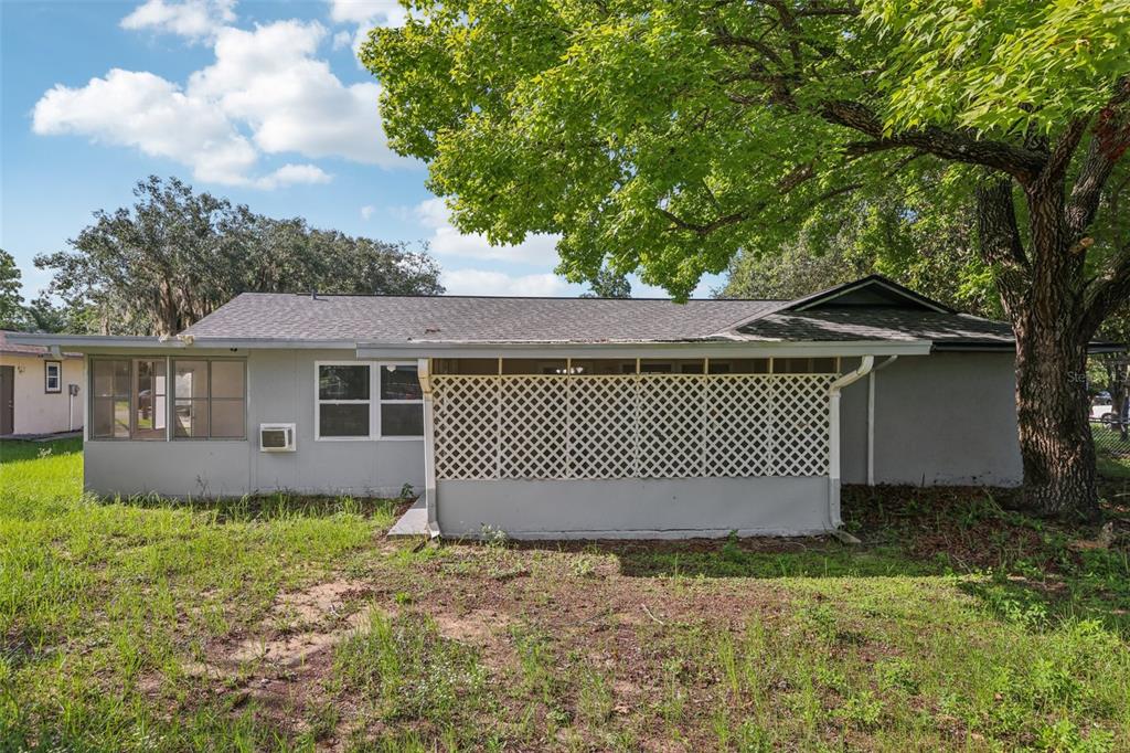 3 Silver Court Ocala, FL 34472 - Photo 23 of 25 a front view of a house with a garden