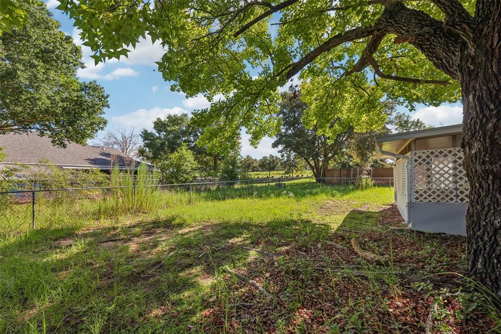 3 Silver Court Ocala, FL 34472 - Photo 25 of 25 a view of a lake with a yard