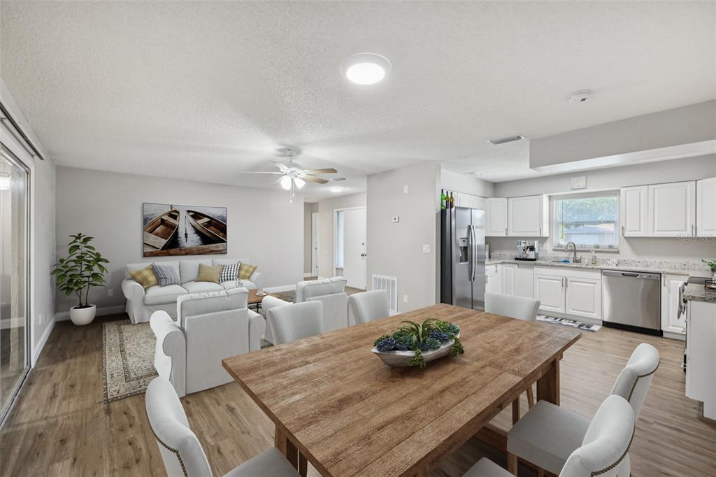 3 Silver Court Ocala, FL 34472 - Photo 5 of 25 a kitchen with a table and chairs