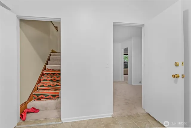 wooden floor with white walls
