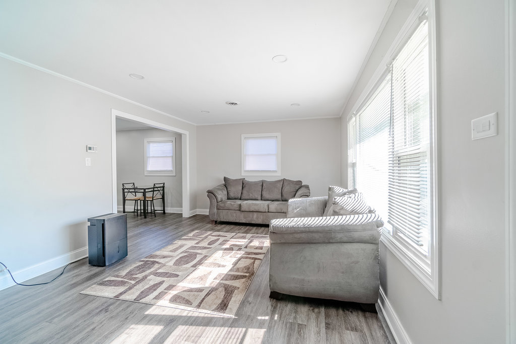 172 Monee Road Park Forest, IL 60466 - Photo 3 of 16 a living room with furniture and a window