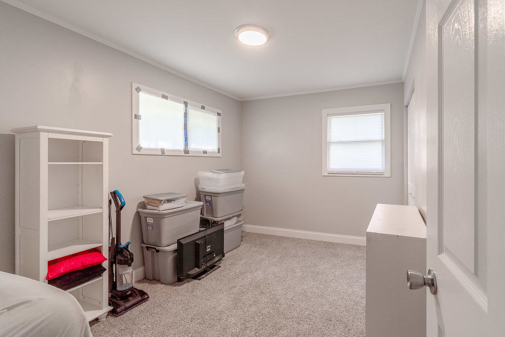 172 Monee Road Park Forest, IL 60466 - Photo 10 of 16 a room with furniture and a window